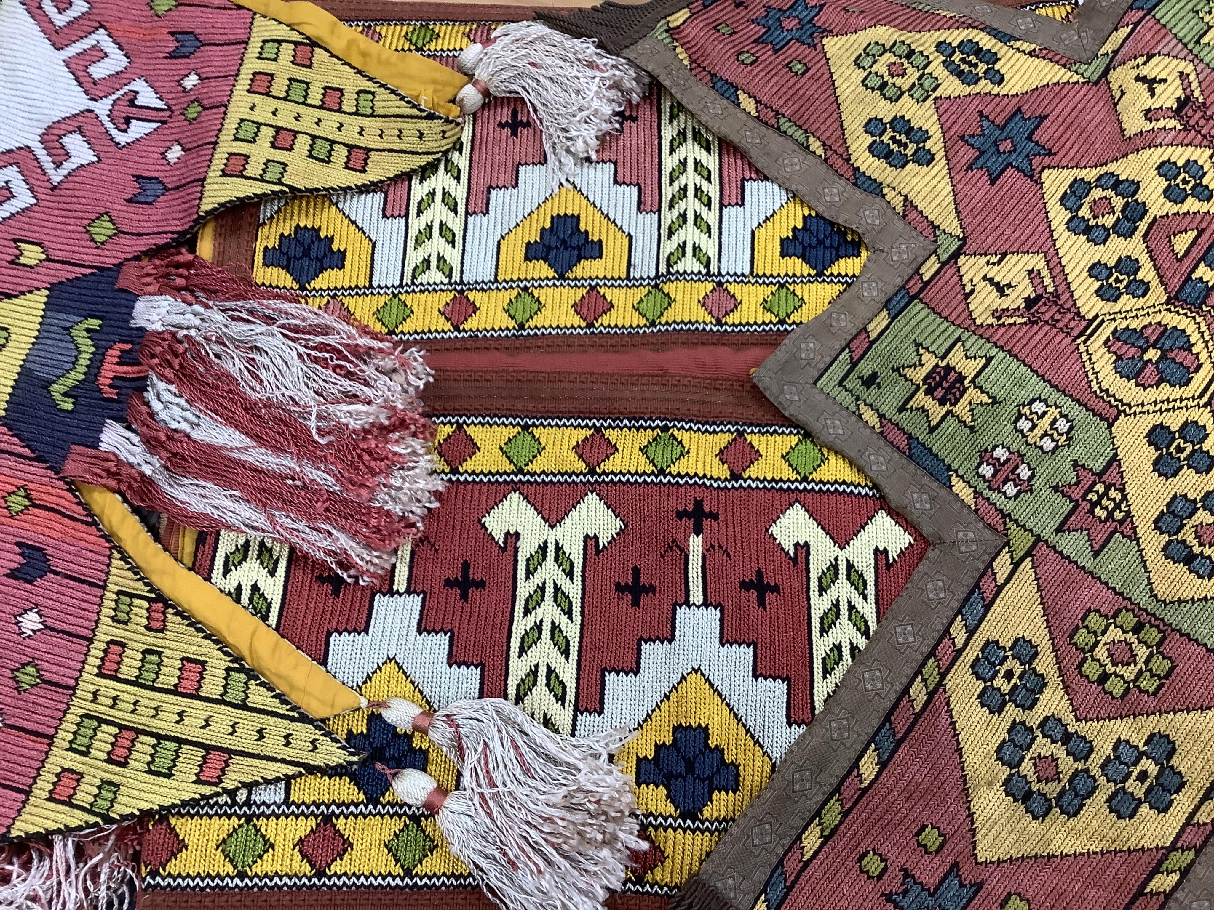 A unusual matching group of 20th century French Ecclesiastical knitted textiles, with Caucasian design elements. Hand embroidered with coloured silks in a bold geometric design, bordered with gold braiding and tasselling